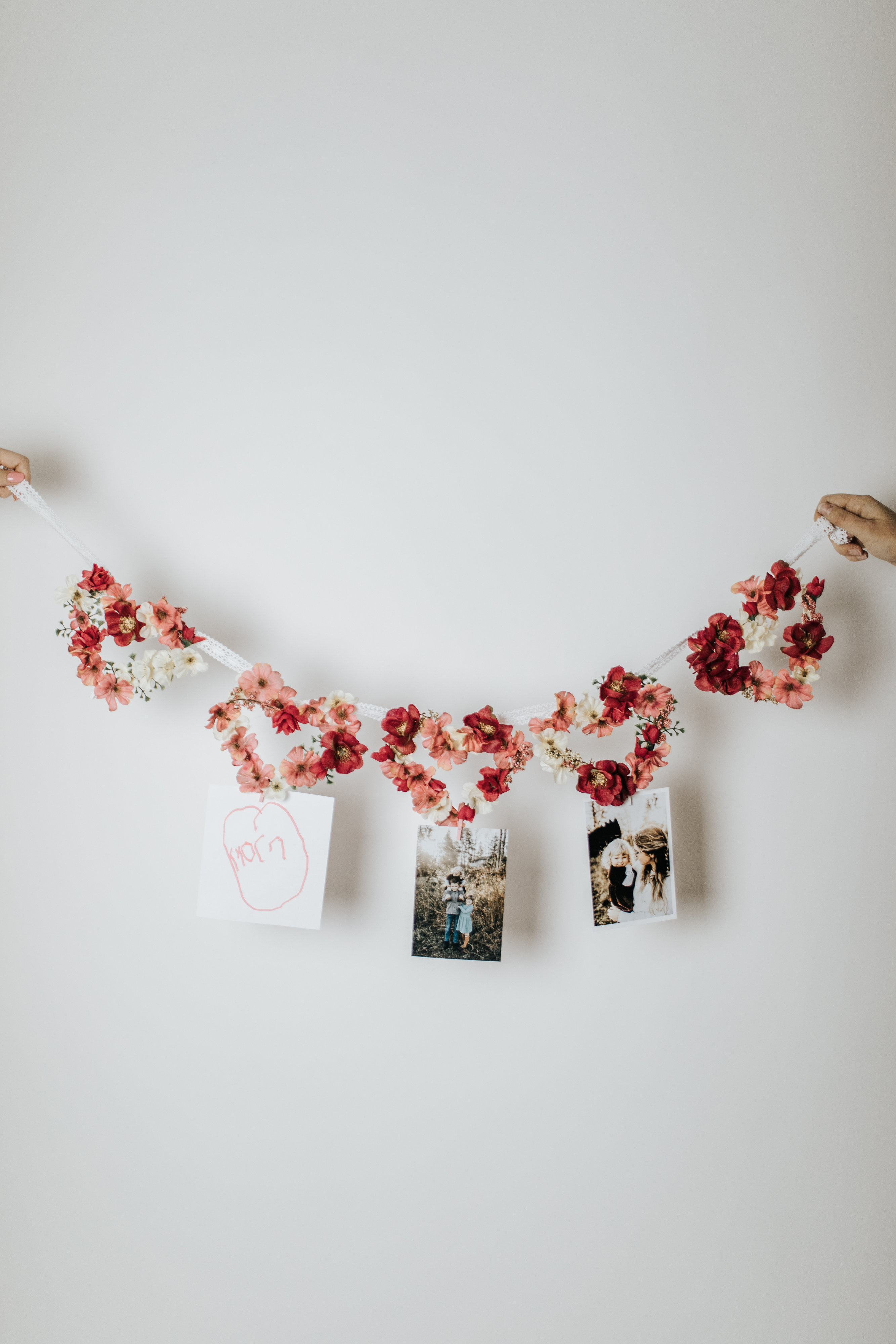 Instructions and Supplied for how to make a faux heart shaped garland using popsicles