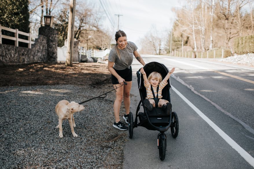 Going for a run with our puppy and child in the Thule jogging stroller