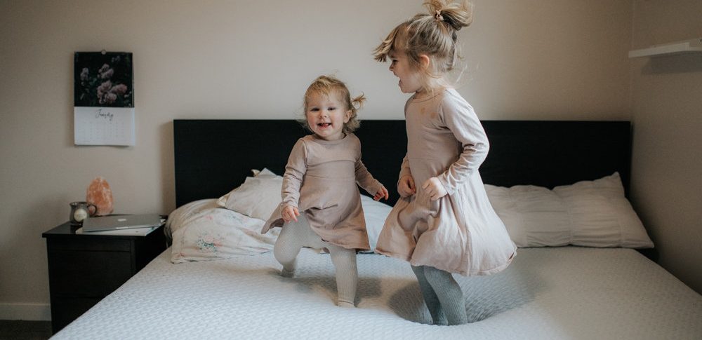 Two LIttle Monkey Jumping on the Bed | Canadian "Bed in a Box" Mattress Review // Photo by Julie Christine Photography